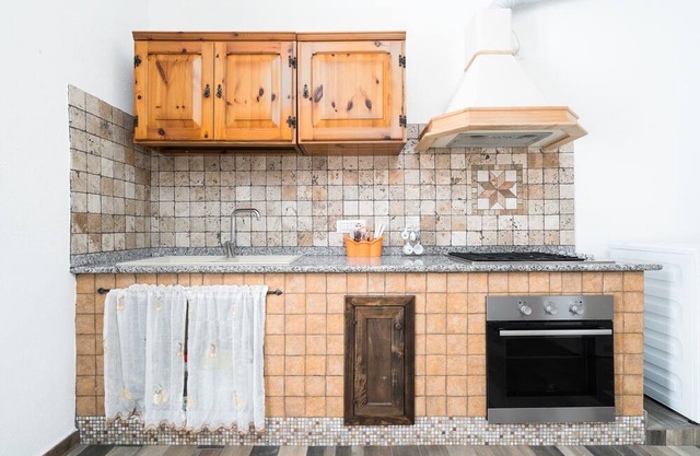 Apartment 'Casa Vacanza Nel Centro Di Irgoli' with Private Terrace, Wi-Fi and Air Conditioning