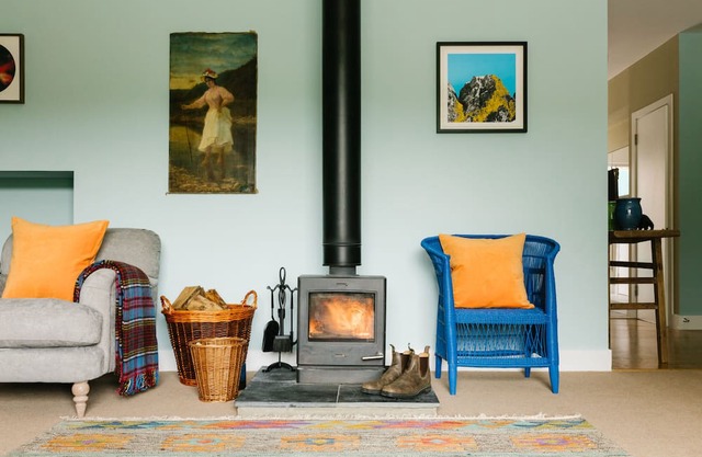 A cosy colourful cottage with a great view