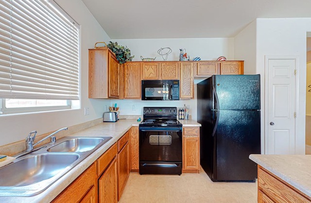 Comfortable home with enclosed yard, furnished patio, & washer/dryer