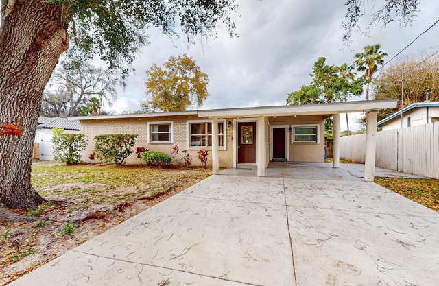 Lakefront home with private patio, waterfront sitting area, & W/D