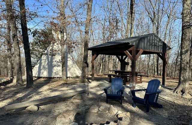 A teepee on 1200-acre ranch where secluded woods envelope the grounds.