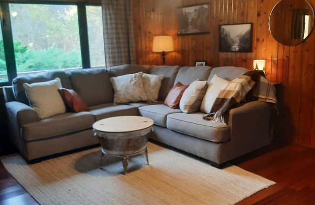 Log cabin style duplex on 150 acres of beautifully serene wooded farmland
