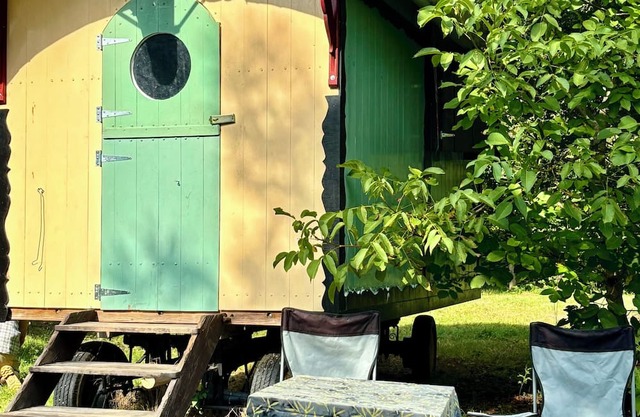 Cozy shepherd's hut in an edible landscape on a permaculture farm