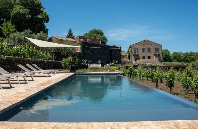 Borgo Rovittello, traditional Sicilian house with pool immersed in vineyards.