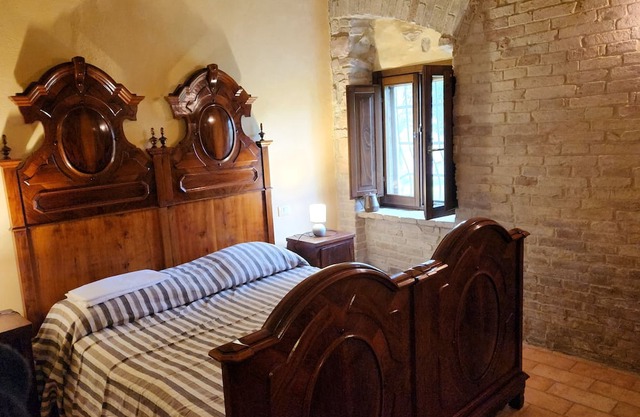 Cà Paradiso - Room '800 private bath, sitting area, fireplace and kitchen shared