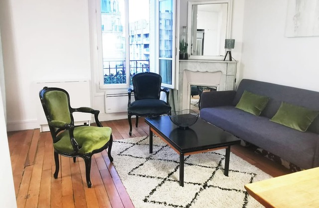 Elegant, peaceful Haussmann-style apartment in a charming tree-lined street.
