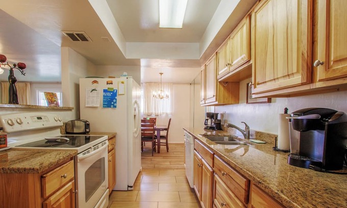 Tucson House | Charming 2-bedroom townhome, 2 car carport, open DR, LR, Kitchen, Patio, Pool