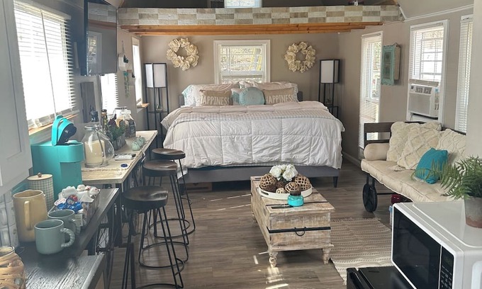 Travelers Rest Apartment | Country Farm Bliss is a rustic tiny home located on Farm.