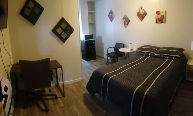 Savage House | Affordable cozy room meets unbeatable convenience.
