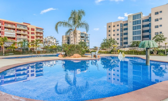 Mil Palmeras Apartment | Apartment 'Gran Terraza Vistas Mar' with Shared Pool, Wi-Fi and Air Conditioning