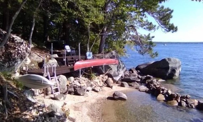 South Casco Cottage | Vintage cottage with beautiful mountain views across Sebago Lake.