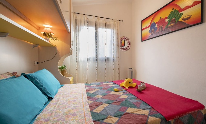 La Muddizza House | Holiday Home 'Residence Mazzini Int 25' with Shared Pool, Terrace and Air Conditioning