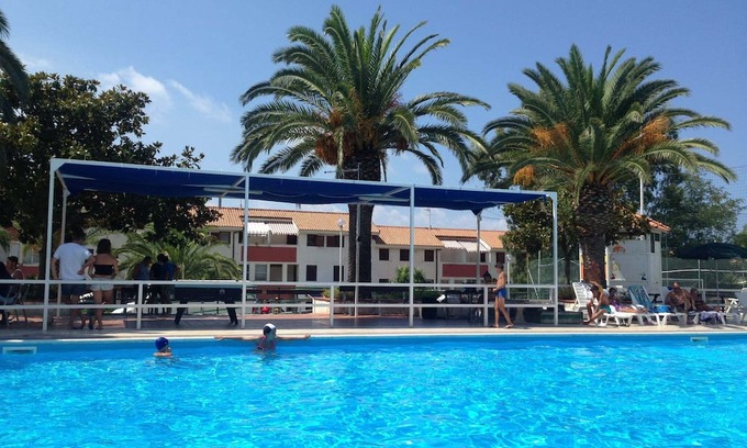 Falerna Apartment | Holiday Apartment "Trilocale 33 Residence La Giungla" with Sea View, Shared Pool & Wi-Fi