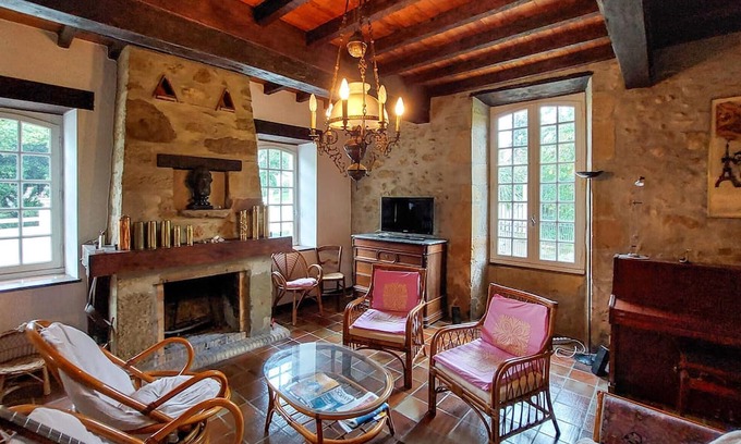 Conchez-de-Bearn House | Enjoy a relaxing break close to nature in this inviting vacation home.