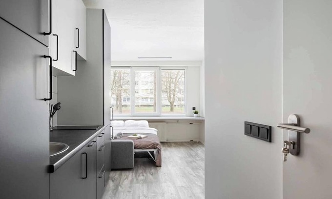 Business District Apartment | River to the City Self check in